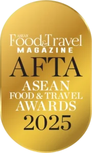 Gold medal-style badge with layered text that reads 'ASEAN Food and Travel Magazine', 'AFTA', and 'ASEAN Food and Travel Awards 2025