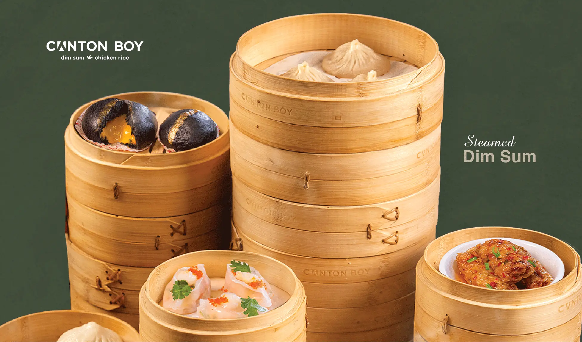 Menu page for Canton Boy which shows our dimsum baskets stacked on top of each other which includes our xiao long bao, salted egg black lava bun