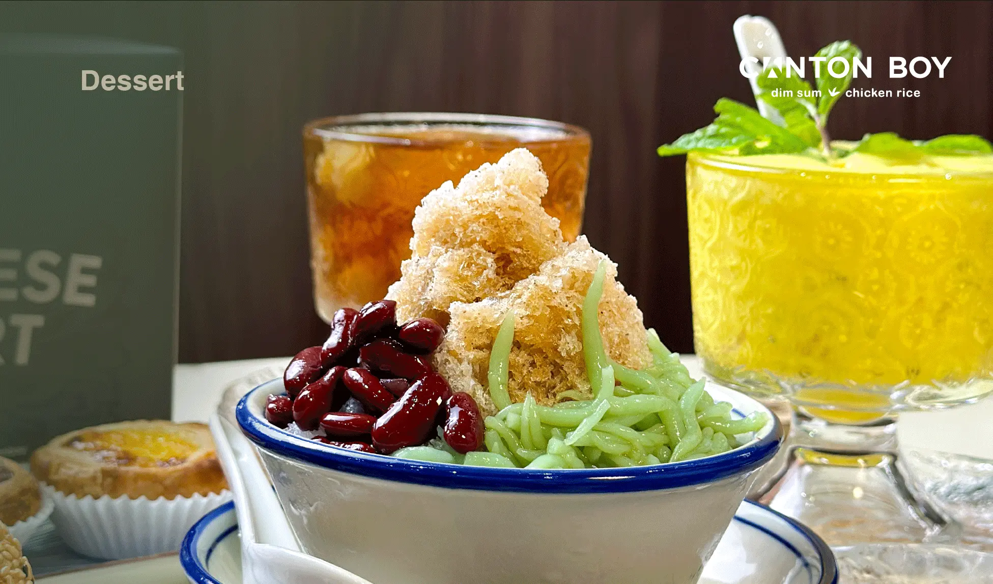Canton Boy menu page featuring two different drinks in the back, our signature cendol as the highlight piece as well as our signature portuguese egg tart on the side